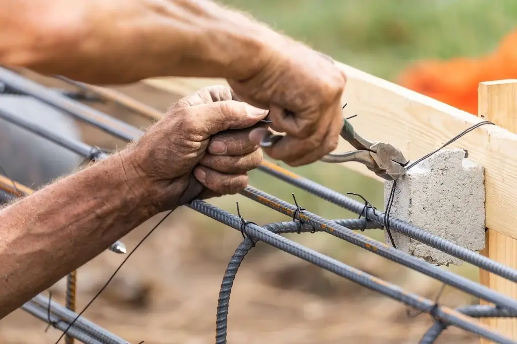 Reinforcing a fence structure is one method in how to fix a cracked fence post for added stability.